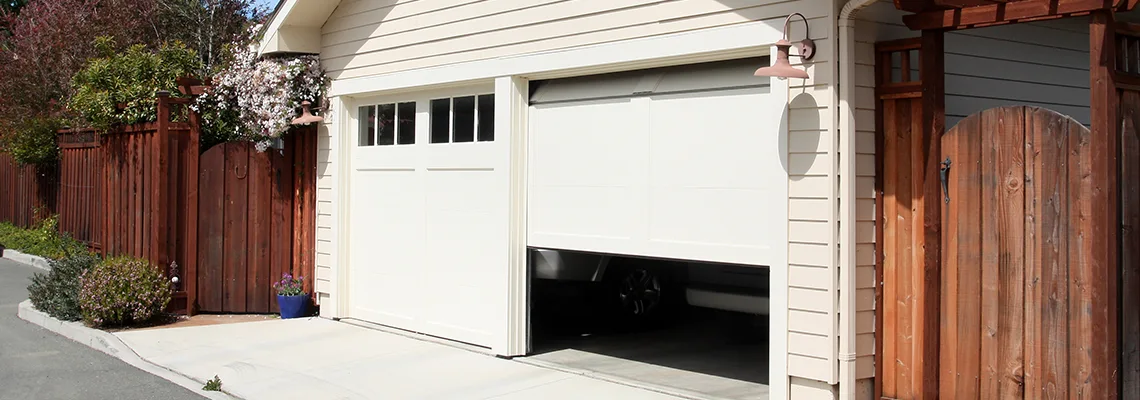 Fix Metal Garage Door Jerking in Melrose Park, Illinois